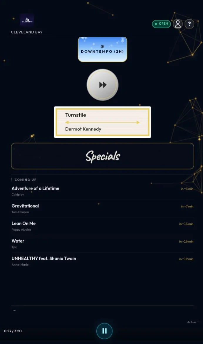 Stylish Ambience venue tablet showing Boost, Chill, and Specials controls alongside now playing